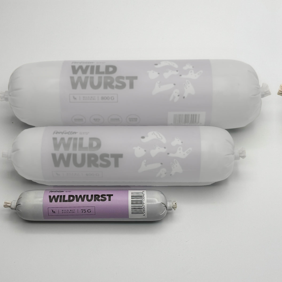 Wild mit Zucchini – 75 g hervorgehoben, daneben die anderen Größen zum Vergleich